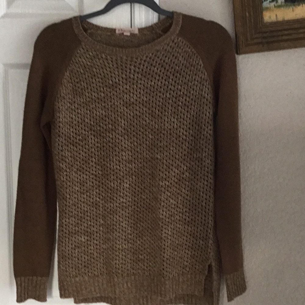 Cashmere sweater with open weave detail.